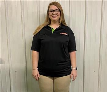 Photo of SERVPRO of Spencer & Iowa Great Lakes Production Crew Member Abby Hefner standing in company shop.