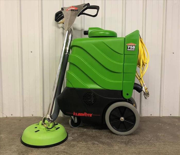 Pictured is the new hard surface cleaner consisting of the extractor/pump machine and the adjustable pressure cleaning wand.