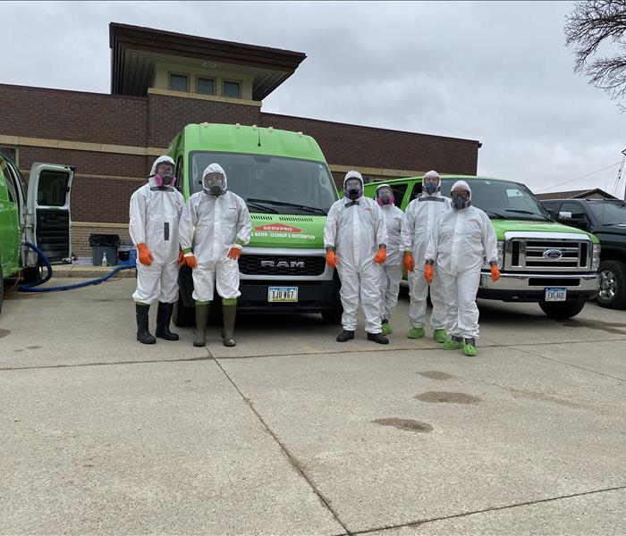 SERVPRO employees getting ready to perform biohazard cleaning. 