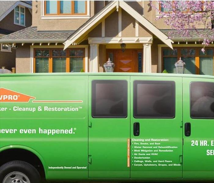 SERVPRO van in front of a house. 