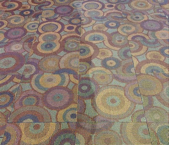 Side by side image of carpets before and after cleaning. 